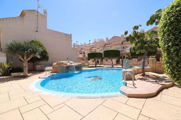 Foto 1 de Xalet en lloguer a Dehesa de Campoamor - La Regia - Aguamarina de 2 habitacions amb terrassa i piscina