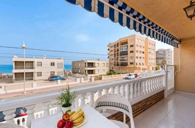 Foto 1 de Àtic en venda a Guardamar Playa de 3 habitacions amb garatge i balcó