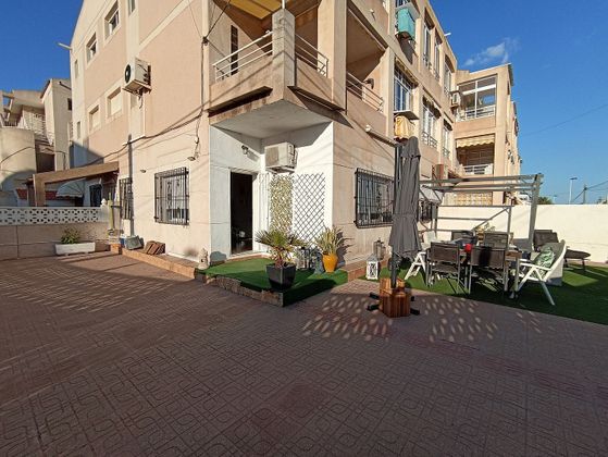 Foto 2 de Casa adosada en venta en calle Gabriela Mistral de 2 habitaciones con terraza y piscina