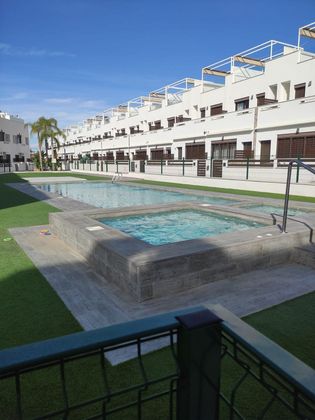 Foto 1 de Casa adossada en venda a La Siesta - El Salado - Torreta de 3 habitacions amb terrassa i piscina