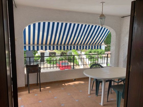 Foto 1 de Venta de casa adosada en Cabo Roig - La Zenia de 4 habitaciones con terraza y piscina