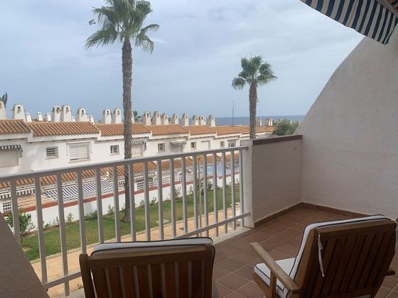 Foto 1 de Casa adossada en venda a Dehesa de Campoamor - La Regia - Aguamarina de 3 habitacions amb terrassa i piscina