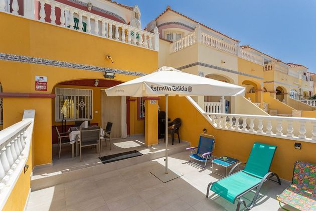 Foto 1 de Venta de casa en Dehesa de Campoamor - La Regia - Aguamarina de 2 habitaciones con terraza y piscina