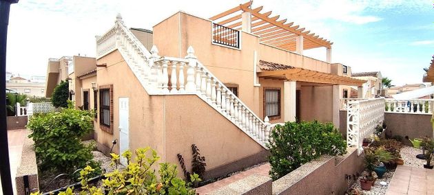 Foto 1 de Venta de casa adosada en San Miguel de Salinas de 2 habitaciones con terraza y jardín