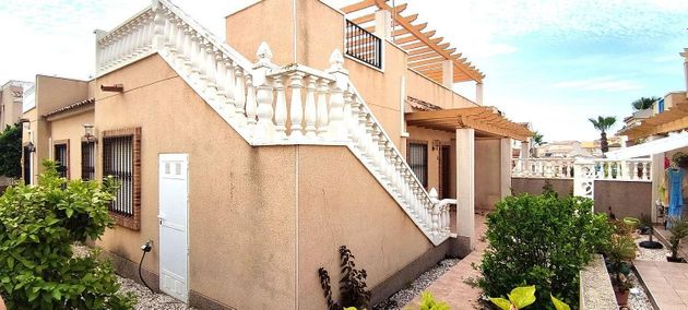 Foto 2 de Venta de casa adosada en San Miguel de Salinas de 2 habitaciones con terraza y jardín