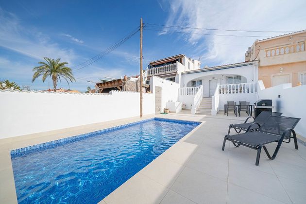 Foto 1 de Casa adossada en venda a calle Costa Balear de 2 habitacions amb terrassa i piscina