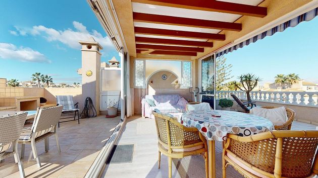 Foto 1 de Àtic en venda a Dehesa de Campoamor - La Regia - Aguamarina de 2 habitacions amb terrassa i piscina