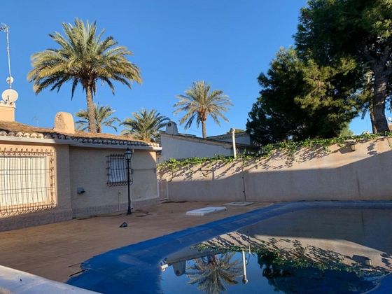 Foto 2 de Chalet en venta en Playa Flamenca - Punta Prima de 4 habitaciones con terraza y piscina