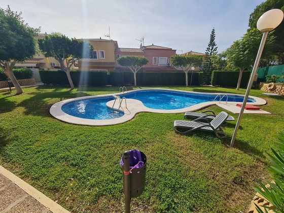 Foto 1 de Venta de casa adosada en L'Albir-Zona Playa de 3 habitaciones con terraza y piscina