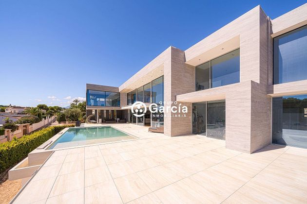 Foto 1 de Venta de casa en Pinar del Advocat - Cometa de 6 habitaciones con piscina y garaje