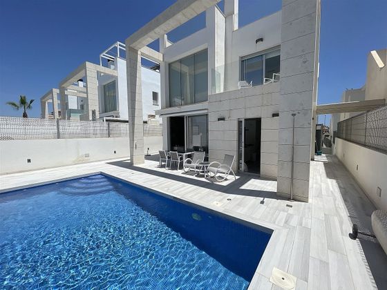 Foto 1 de Casa en venda a calle Cabo de Palos de 4 habitacions amb terrassa i piscina
