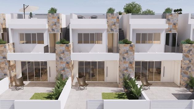 Foto 2 de Venta de casa adosada en Cabo Roig - La Zenia de 3 habitaciones con terraza y piscina