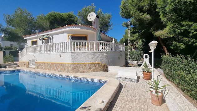 Foto 1 de Venta de chalet en Pinar de Campoverde de 2 habitaciones con terraza y piscina