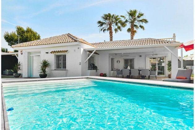 Foto 1 de Venta de casa en Campos de Golf - Villa Martin - Los Dolses de 4 habitaciones con terraza y piscina