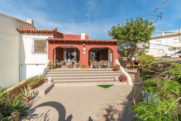 Foto 1 de Casa en venda a Playa Flamenca - Punta Prima de 3 habitacions amb terrassa i piscina