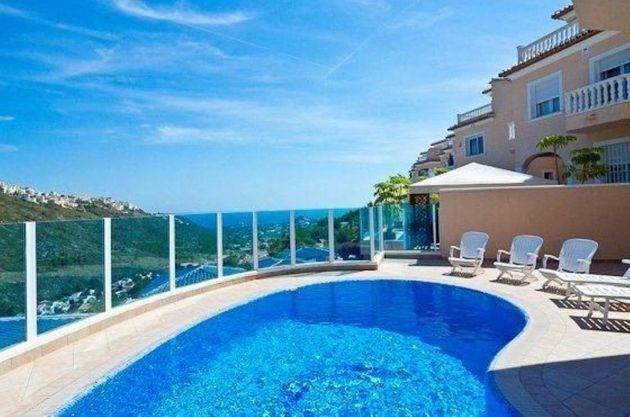 Foto 1 de Chalet en venta en El Portet - Pla de Mar de 4 habitaciones con piscina y jardín