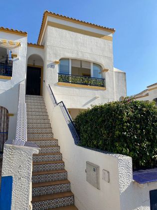 Foto 2 de Casa adosada en venta en avenida D'escandinàvia de 3 habitaciones con terraza y piscina