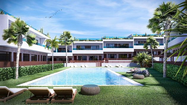 Foto 1 de Casa adossada en venda a Los Balcones - Los Altos del Edén de 3 habitacions amb terrassa i piscina