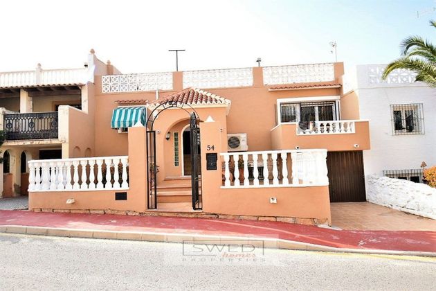Foto 1 de Venta de casa en Torrelamata - La Mata de 6 habitaciones con terraza y garaje