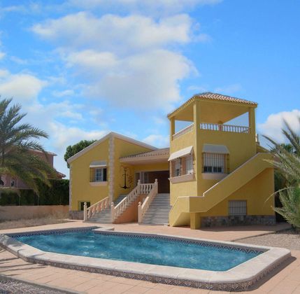 Foto 2 de Venta de chalet en Zona Galúa-Calnegre de 3 habitaciones con terraza y piscina