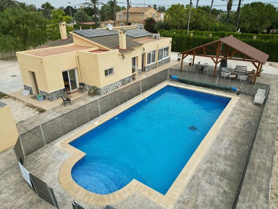 Foto 1 de Casa en venta en Carrús Oest - El Toscar de 5 habitaciones con piscina y jardín