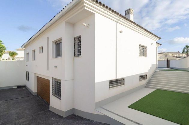 Foto 1 de Chalet en venta en Gran Alacant de 4 habitaciones con terraza y piscina