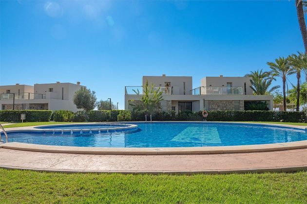 Foto 1 de Casa adossada en venda a calle Partida Paraíso de 3 habitacions amb terrassa i piscina