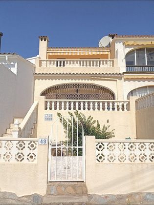 Foto 1 de Casa adosada en venta en Nucia (la) de 2 habitaciones con terraza y jardín