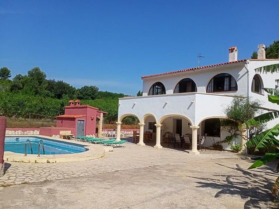 Foto 1 de Casa rural en venda a Benidoleig de 5 habitacions amb terrassa i piscina