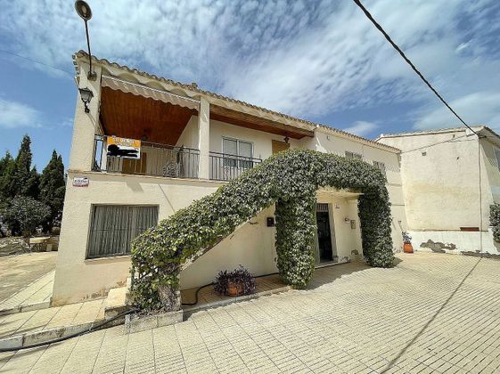 Foto 1 de Casa adossada en venda a Salinas de 5 habitacions amb terrassa i piscina