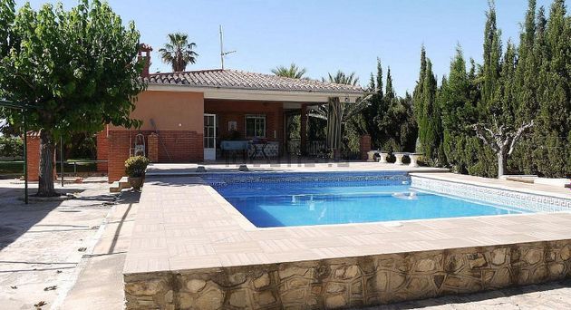 Foto 1 de Casa en venda a Agost de 5 habitacions amb piscina i garatge