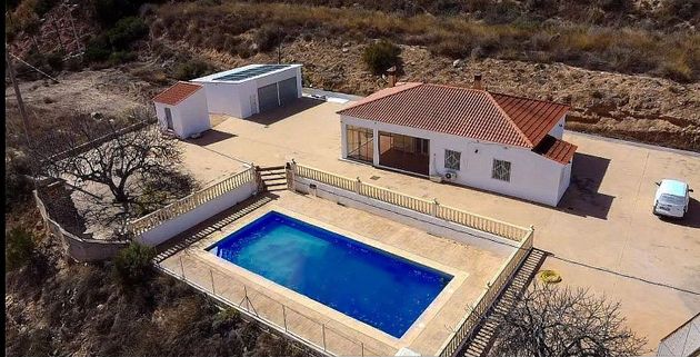 Foto 1 de Casa en venda a Aspe de 4 habitacions amb piscina i garatge