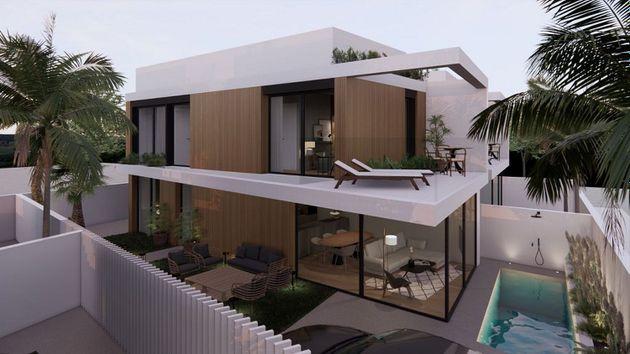 Foto 1 de Casa adossada en venda a avenida Sánchez Lozano de 3 habitacions amb terrassa i piscina