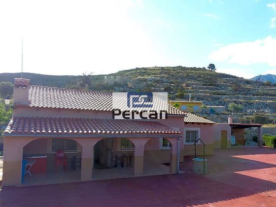 Foto 1 de Chalet en venta en Pueblo Español-Coveta Fumá de 3 habitaciones con jardín y aire acondicionado