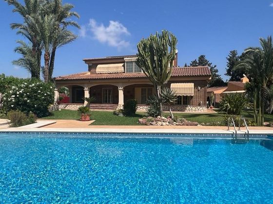Foto 1 de Venta de chalet en Alicante Golf de 5 habitaciones con terraza y piscina