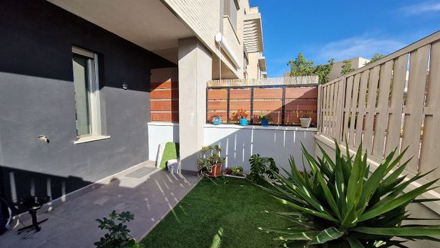 Foto 1 de Casa adosada en venta en calle Tarragona de 3 habitaciones con terraza y piscina