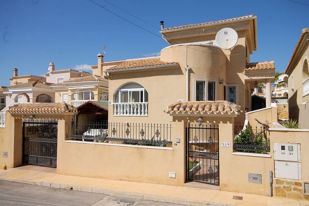 Foto 1 de Venta de casa en San Miguel de Salinas de 3 habitaciones con terraza y piscina