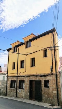 Foto 1 de Casa adosada en venta en calle Maestra Agustina de 4 habitaciones con calefacción