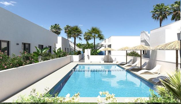 Foto 1 de Casa adossada en venda a Poblets (els) de 3 habitacions amb terrassa i piscina