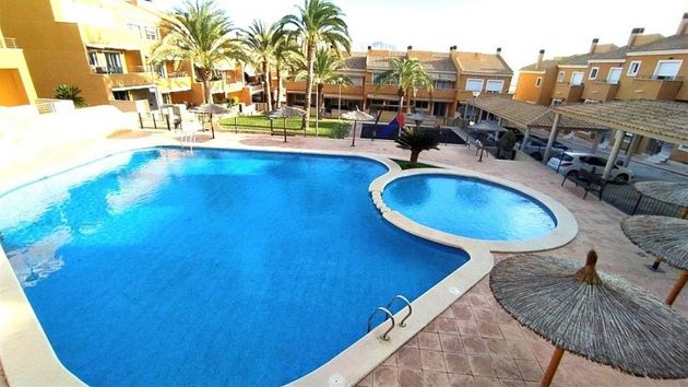 Foto 1 de Venta de casa en Monforte del Cid de 5 habitaciones con terraza y piscina