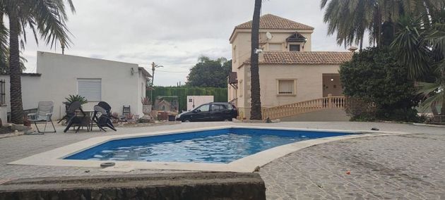 Foto 1 de Piso en venta en Algorós - El Derramador de 8 habitaciones con terraza y piscina