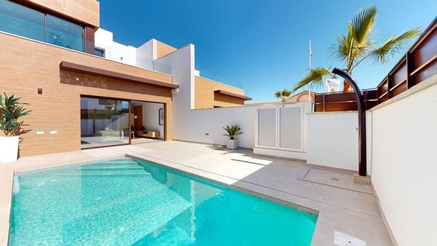 Foto 2 de Casa adosada en venta en Algorfa de 3 habitaciones con terraza y piscina