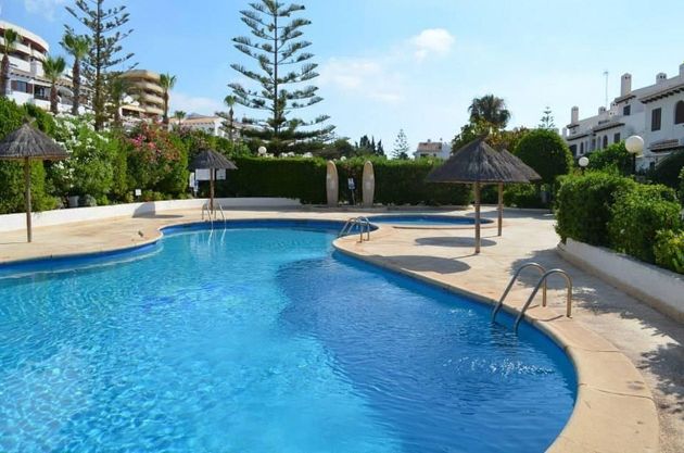 Foto 1 de Casa adossada en lloguer a Campos de Golf - Villa Martin - Los Dolses de 2 habitacions amb piscina i jardí