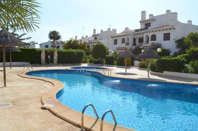Foto 2 de Casa adossada en lloguer a Campos de Golf - Villa Martin - Los Dolses de 2 habitacions amb piscina i jardí