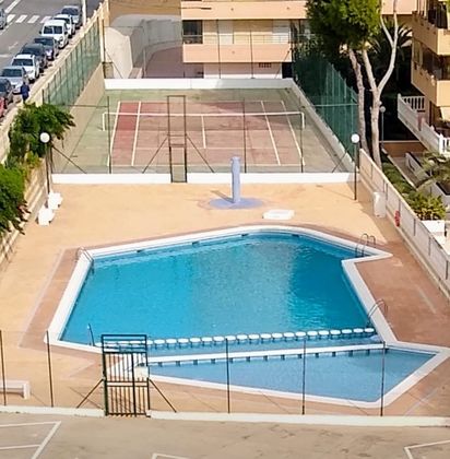 Foto 1 de Pis en lloguer a Los Arenales del Sol de 2 habitacions amb piscina i garatge