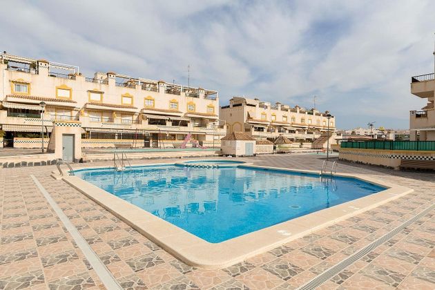 Foto 1 de Dúplex en venda a Playa Tamarit - Playa Lisa - Gran Playa de 2 habitacions amb terrassa i piscina