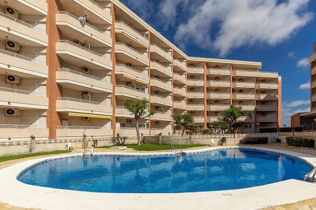 Foto 2 de Piso en venta en Playa Tamarit - Playa Lisa - Gran Playa de 2 habitaciones con terraza y piscina