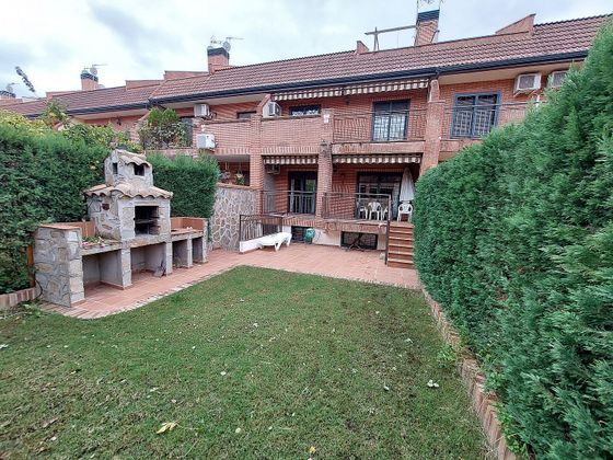Foto 1 de Venta de casa adosada en El Pilar - Bripac de 6 habitaciones con terraza y garaje