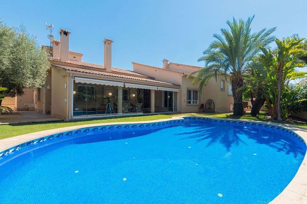 Foto 1 de Casa en venda a Playa Mucha Vista de 4 habitacions amb terrassa i piscina