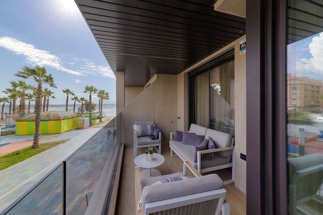 Foto 1 de Venta de piso en Torrelamata - La Mata de 3 habitaciones con terraza y piscina
